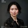 人妻猎人用户体验设计总监陈晓玲的专业形象，展现出创意设计师的艺术气质与专业素养
